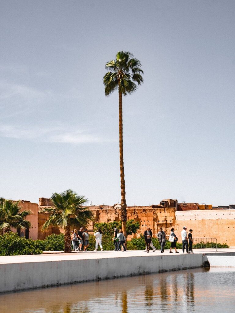 Marrakech safe for tourists: visitors walking at El Badi Palace in daylight
